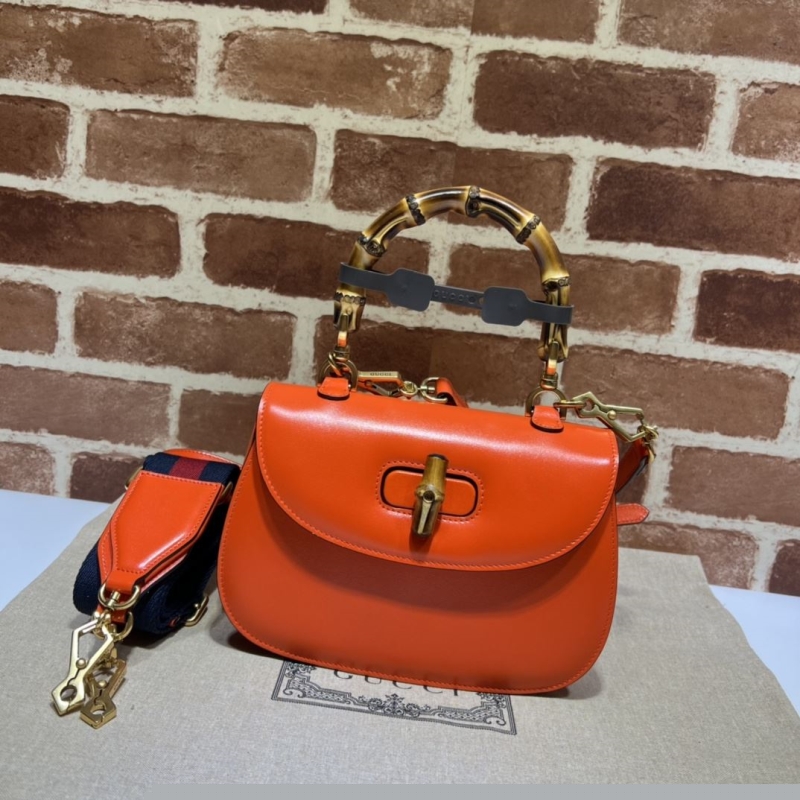 G*u*i top handle bags